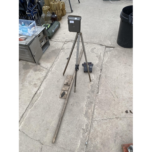 2441 - A VINTAGE LASER LEVEL WITH TRIPOD STAND