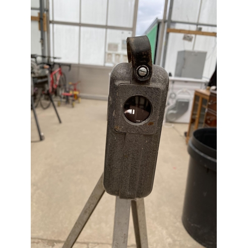 2441 - A VINTAGE LASER LEVEL WITH TRIPOD STAND