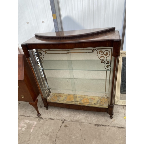 2526 - A MID 20TH CENTURY WALNUT SLIDING DOOR DISPLAY CABINET ON SHORT CABRIOLE LEGS, 41