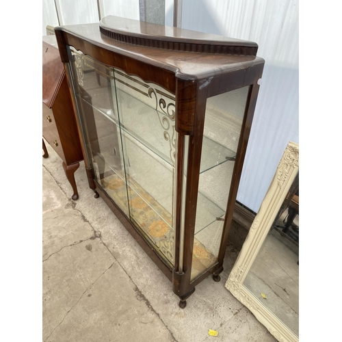 2526 - A MID 20TH CENTURY WALNUT SLIDING DOOR DISPLAY CABINET ON SHORT CABRIOLE LEGS, 41