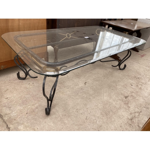 2606 - A MODERN GLASS TOP COFFEE TABLE ON METALWARE BASE, 48X26