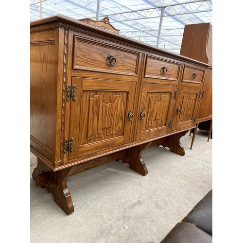 2643 - AN OAK JAYCEE SIDEBOARD WITH LINEN FOLD DOORS, 58