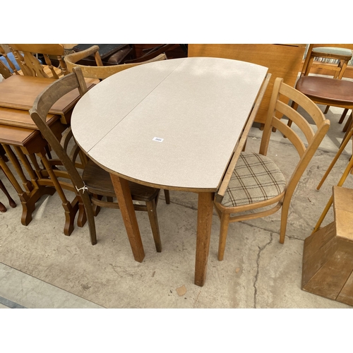 2669 - A FORMICA DROP LEAF TABLE AND THREE CHAIRS