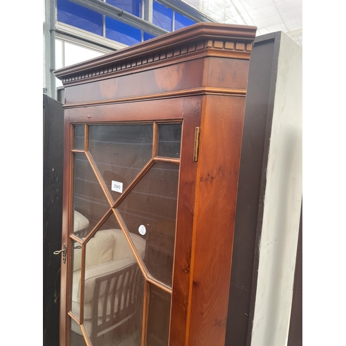 2943 - A YEW WOOD ASTRAGAL GLASED CORNER CUPBOARD