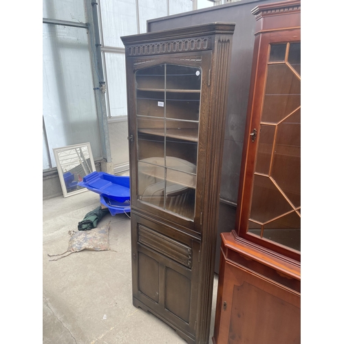 2944 - A MODERN OAK CORNER CUPBOARD WITH GLAZED UPPER PORTION