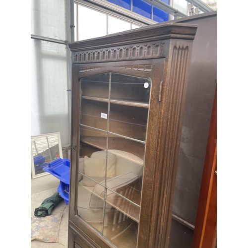 2944 - A MODERN OAK CORNER CUPBOARD WITH GLAZED UPPER PORTION