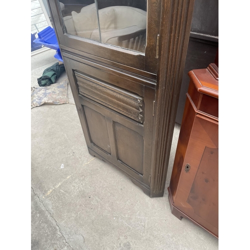 2944 - A MODERN OAK CORNER CUPBOARD WITH GLAZED UPPER PORTION