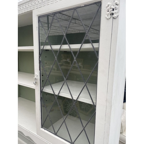 2945 - A MODERN WHITE PAINTED DRESSER WITH GLAZED AND LEADED DOORS TO UPPER PORTION, 60