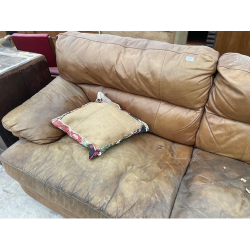 2950 - A DISTRESSED LEATHER TWO SEATER SOFA