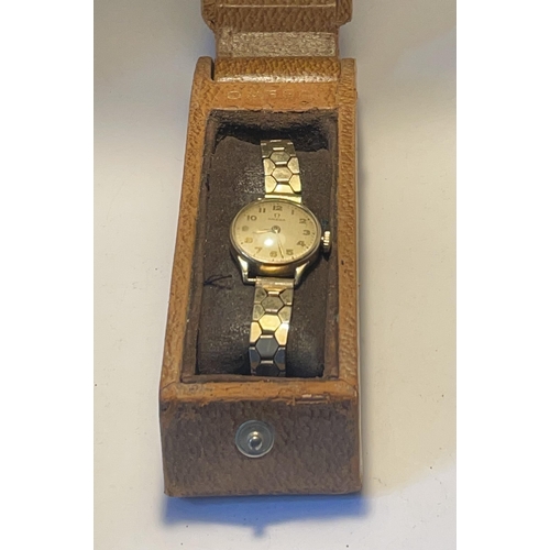 340 - A LADIES OMEGA 9 CARAT GOLD WRIST WATCH WITH ROLLED GOLD STRAP IN ORIGINAL OMEGA CASE SEEN WORKING B... 