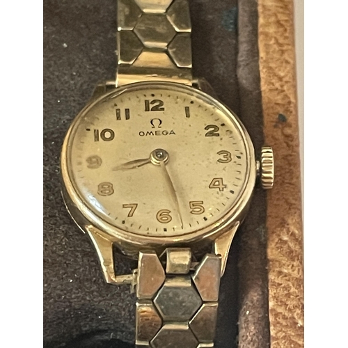 340 - A LADIES OMEGA 9 CARAT GOLD WRIST WATCH WITH ROLLED GOLD STRAP IN ORIGINAL OMEGA CASE SEEN WORKING B... 