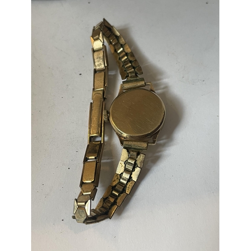 340 - A LADIES OMEGA 9 CARAT GOLD WRIST WATCH WITH ROLLED GOLD STRAP IN ORIGINAL OMEGA CASE SEEN WORKING B... 