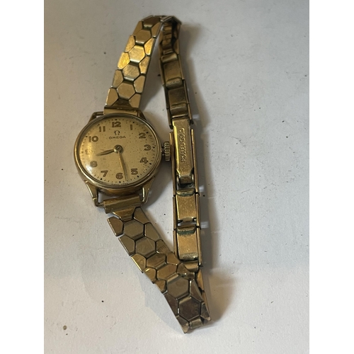 340 - A LADIES OMEGA 9 CARAT GOLD WRIST WATCH WITH ROLLED GOLD STRAP IN ORIGINAL OMEGA CASE SEEN WORKING B... 