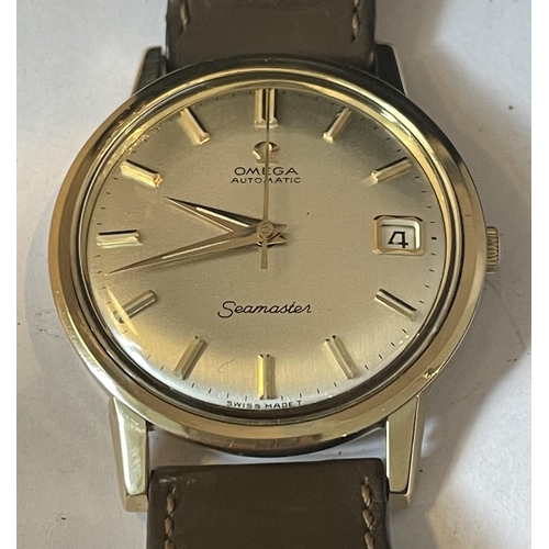 342 - A GENTS OMEGA SEAMASTER 9 CARAT GOLD AUTOMATIC WRIST WATCH IN A PRESENTATION BOX SEEN WORKING BUT NO... 