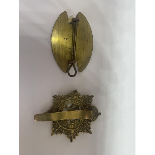 FOUR MILITARY MEDALS AND BADGES