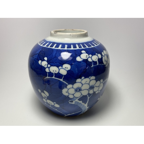 303 - AN EARLY 20TH CENTURY CHINESE BLUE AND WHITE PRUNUS PATTERN GINGER JAR, DOUBLE RING MARK TO BASE, HE... 