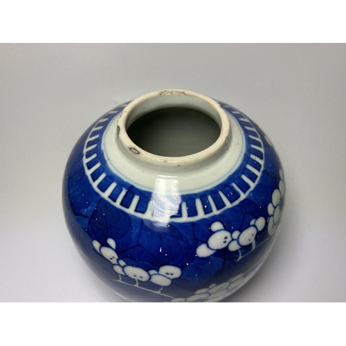 303 - AN EARLY 20TH CENTURY CHINESE BLUE AND WHITE PRUNUS PATTERN GINGER JAR, DOUBLE RING MARK TO BASE, HE... 