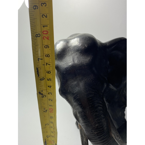 314 - AN EARLY 20TH CENTURY JAPANESE METAL MODEL OF AN ELEPHANT, 20 X 27CM