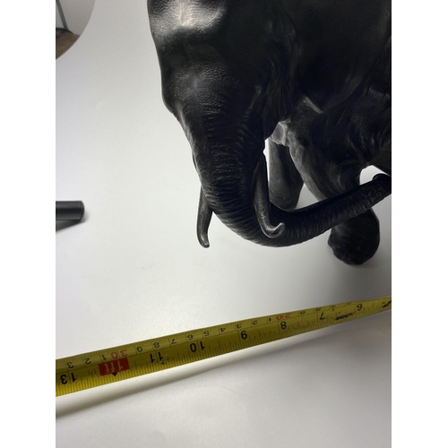 314 - AN EARLY 20TH CENTURY JAPANESE METAL MODEL OF AN ELEPHANT, 20 X 27CM