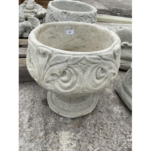 161 - A PAIR OF FLEUR-DE LYS URNS DEPICTING THE STYLIZED 3 PETAL DESIGN NO VAT