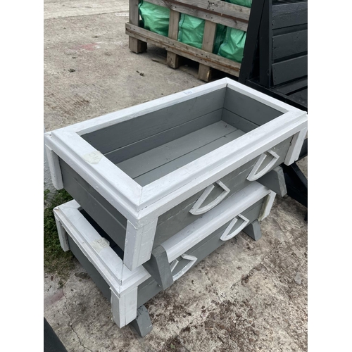 213 - TWO PAINTED WOODEN TROUGHS NO VAT