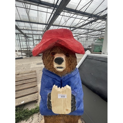 215 - A PADDINGTON BEAR WOOD CARVING APPROXIMATELY 100CM TALL NO VAT