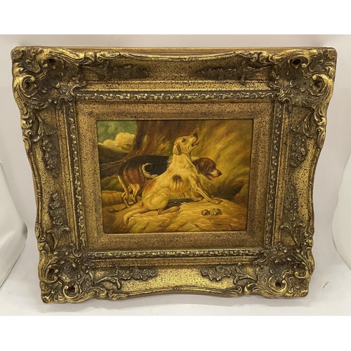 1 - A VICTORIAN GILT FRAMED OIL ON METAL OF TWO HUNTING DOGS, FRAMED BY BIGGS & SONS