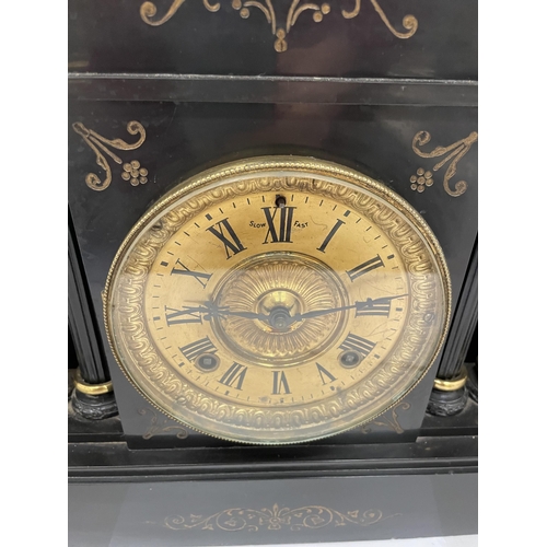 13 - AN ANTIQUE BLACK SLATE MARBLE MANTLE CLOCK WITH TRIPLE CORINTHIAN COLUMNS AND GILT DESIGN DIAL, WITH... 