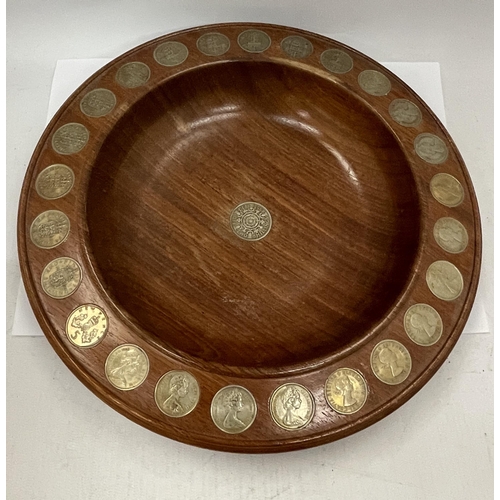 17 - A VINTAGE WOODEN BOWL INSET WITH OLD SHILLINGS