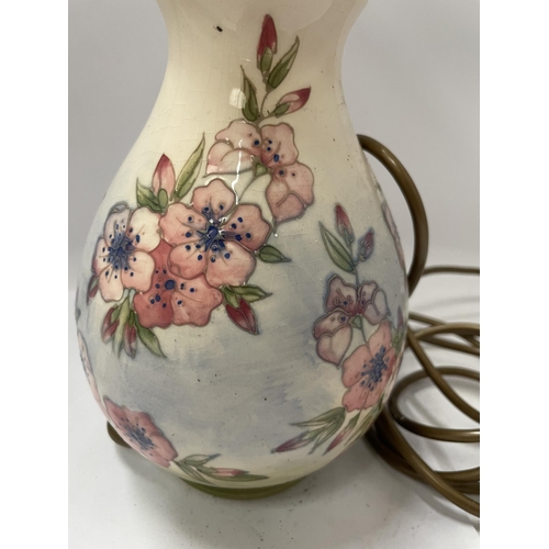 47 - A MOORCROFT POTTERY LAMP DECORATED IN THE 'SPRING BLOSSOM' PATTERN BY DESIGNER SALLY TUFFIN