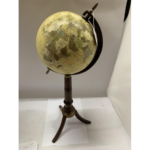 61 - A WORLD GLOBE ON WOODEN BASE