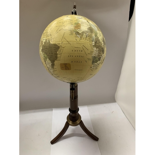 61 - A WORLD GLOBE ON WOODEN BASE