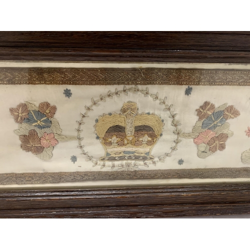 72 - A VINTAGE WOODEN FRAMED EMBROIDERY WITH CROWN DESIGN