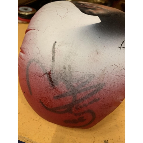 99 - A SIGNED NASEEM HAMED BOXING GLOVE