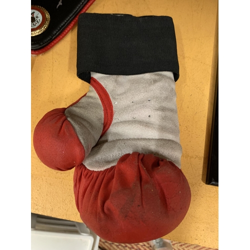 99 - A SIGNED NASEEM HAMED BOXING GLOVE