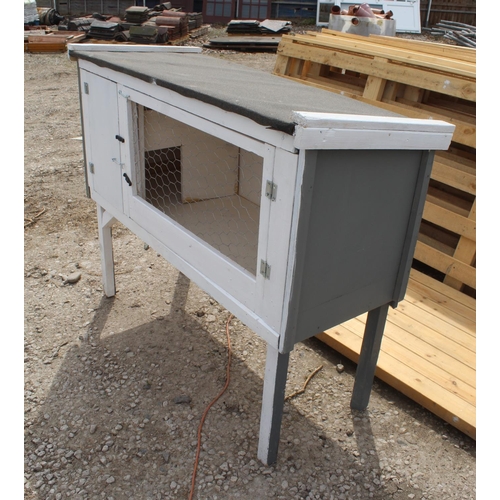 A RABBIT HUTCH ON LEGS NO VAT