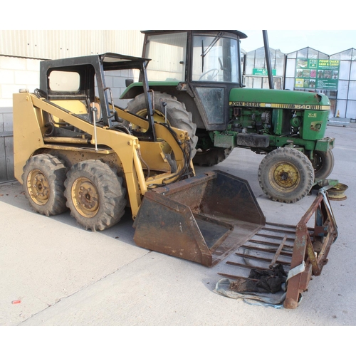 183 - A CATERPILLAR SKID STEER + BUCKET + FORKS SPARES OR REPAIRS + VAT