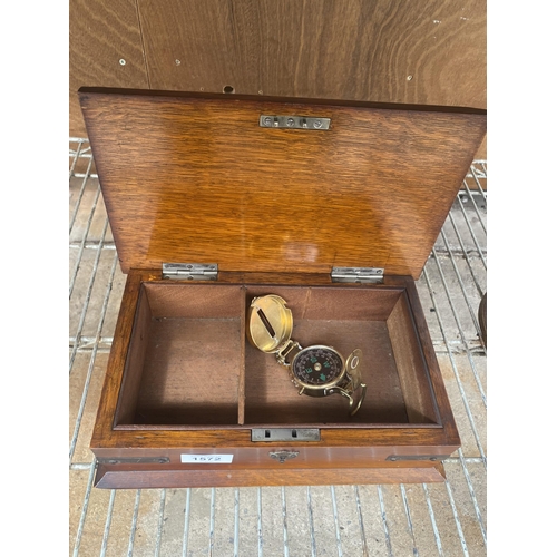 1572 - A VINTAGE WOODEN BOX AND A BRASS COMPASS