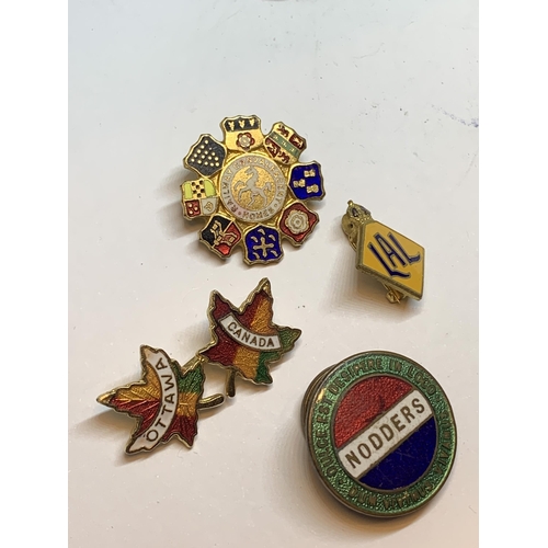 697 - SEVEN VARIOUS VINTAGE ENAMEL BADGES