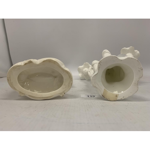 110 - TWO PIECES OF CREAMWARE, ONE A CANDLESTICK, THE OTHER A SPILL HOLDER, BOTH WITH FIGURINES