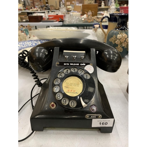 160 - A VINTAGE BLACK BAKELITE ROTARY DIAL TELEPHONE