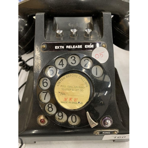 160 - A VINTAGE BLACK BAKELITE ROTARY DIAL TELEPHONE