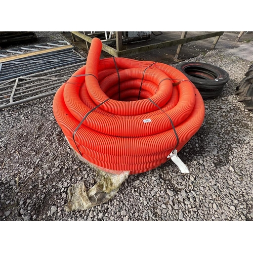 1273 - A ROLL OF ORANGE DRAIN PIPE  NO VAT