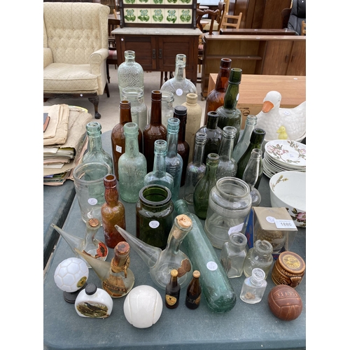 1880 - A LARGE ASSORTMENT OF GLASS BOTTLES TO INCLUDE SOME BEARING NAMES