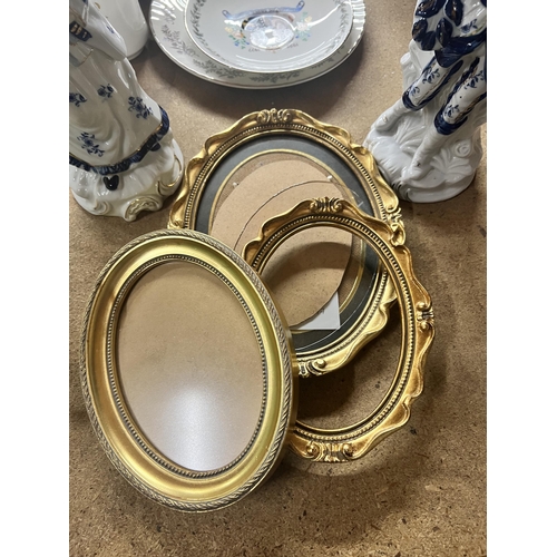 1090 - A PAIR OF CONTINENTAL FIGURES PLUS THREE SMALL GILT PICTURE FRAMES