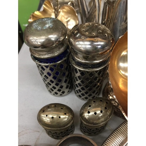 1192 - A LARGE QUANTITY OF SILVER PLATED ITEMS TO INCLUDE A CANDLEABRA, CRUETS, TRAYS, A HAND MIRROR, NAPKI... 