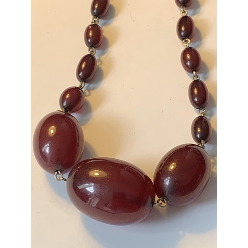 701 - A CHERRY AMBER NECKLACE