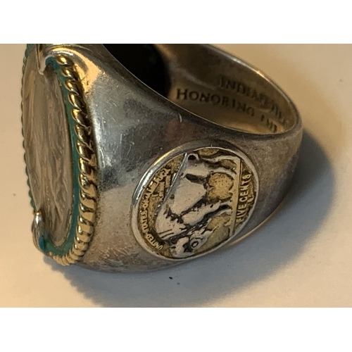 703 - A LARGE RING WITH A FIVE CENT COIN ENGRAVED 'INDIAN HEAD NICKEL HONOURING THE AMERICAN WEST'