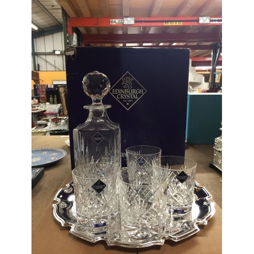 1080 - AN EDINBURGH CRYSTAL WHISKY DECANTER, FOUR WHISKY GLASSES AND A SILVER PLATED TRAY - BOXED