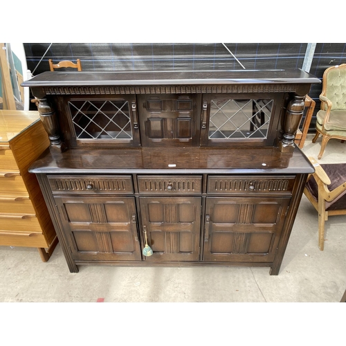 2952 - A PRIORY COURT CUPBOARD WITH PARTIALLY GLAZED AND LEADED UPPER PORTION, 60